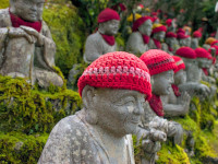 Jizo Buddhist statues with red caps